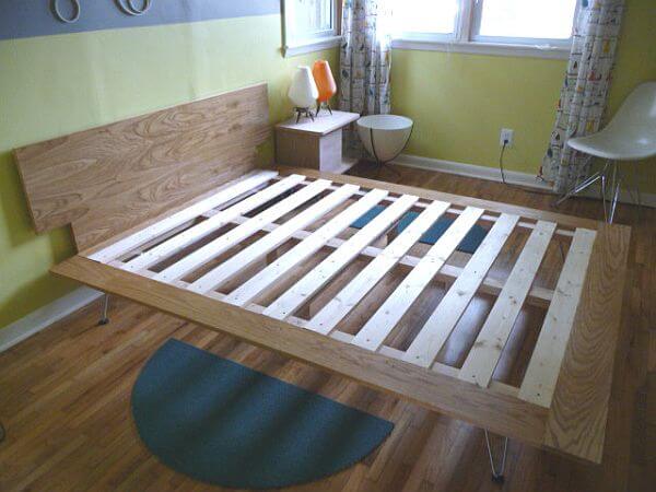 A bed frame being built.