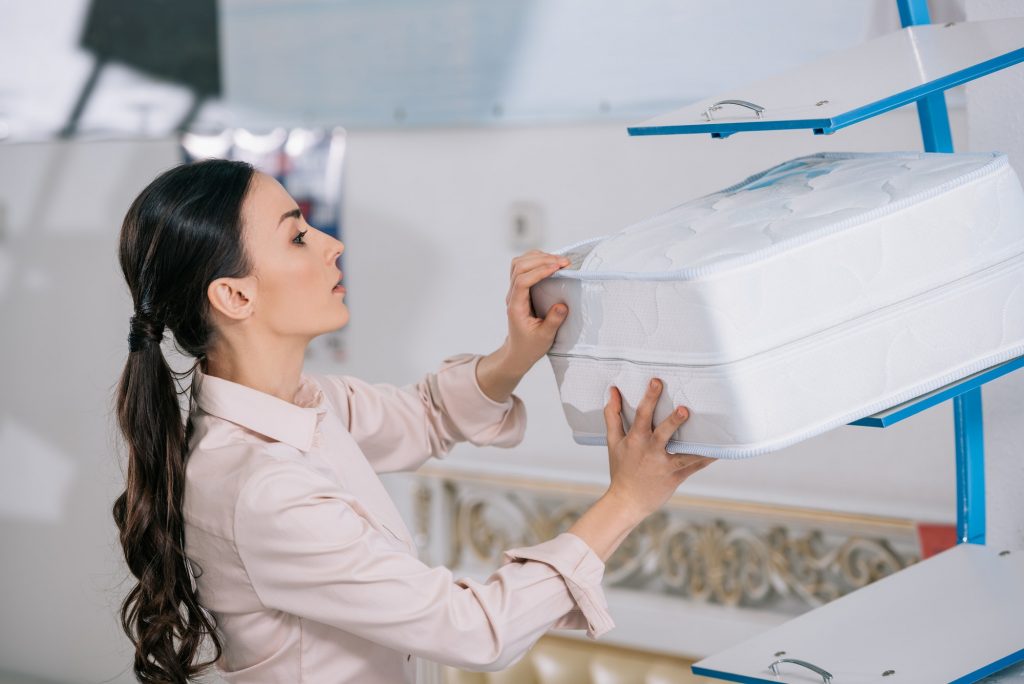 Why Buy A Single Side Mattresses? Woman Shopping For Mattresses.